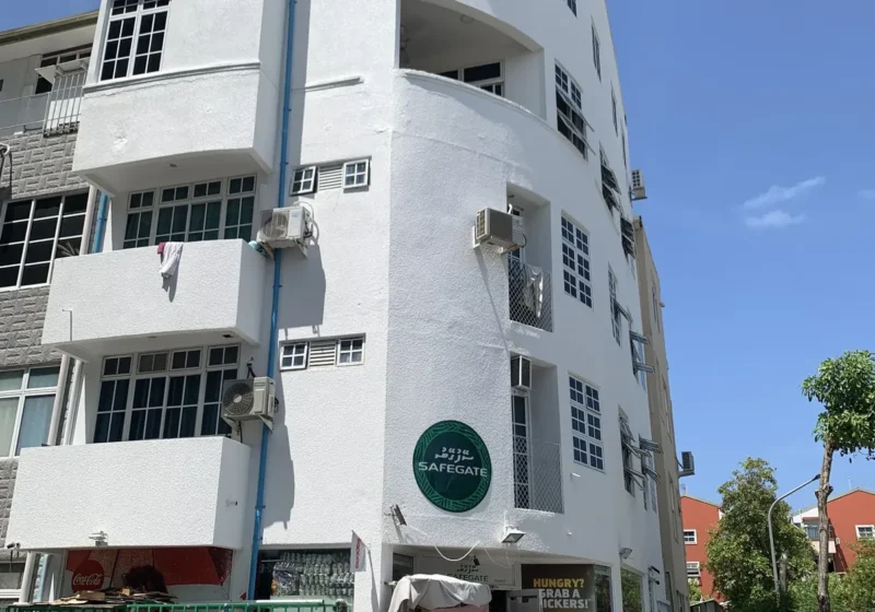 Exterior repainting of a five-storey corner building — Abdulla Haleem, 2021